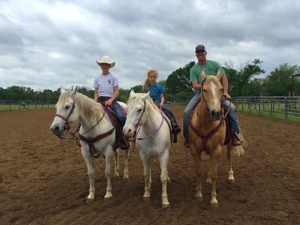 Doty in the arena with son, Hunter and daughter, Presley.  (Courtesy of Brian Doty)